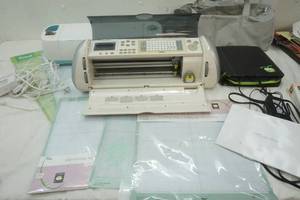 lot 90 image: 3 Boxes of Crafting Cricut & Accessories