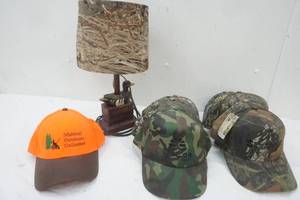 lot 177 image: Hunting hats and lamp