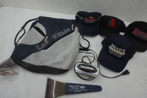 lot 213 image: Las Vegas Bag, 100 Wallet, Hats and Alarm Clock