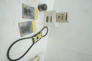 lot 266 image: Case Fuel Kit A41745, Wix Filter, Bobcat Filter 854571, Belt and Quick Tee Jets, Single Hose Shank