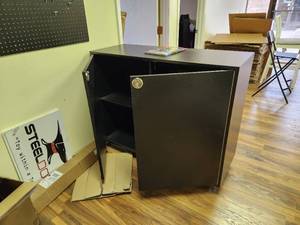 lot 282 image: Steel Dog logo Storage Cabinet 2-door