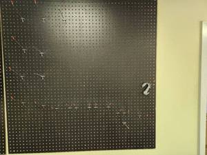 lot 283 image: Wall Mount Peg Board with Peg Hooks