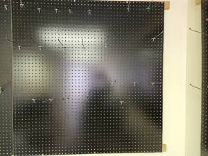 lot 285 image: Wall Mount Peg Board with Peg Hooks