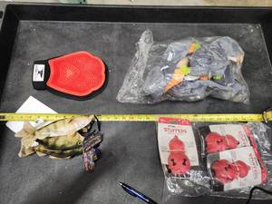 lot 228 image: Lot of (4) Steel Dog - Pot Potatoes and Carrots 6-pack, Spiked Bouncer 3-pack, Stuffless Yellow Perch 3-pack, Brush Mitt