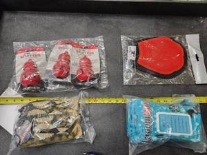 lot 231 image: Steel Dog Dog Toys - Stuffless Yellow Perch 6-pack, Spiked Bouncer 3-pack, Wet Wipes 3-pack, Brush Mitt