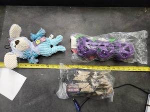lot 235 image: Lot of (3) Steel Dog - Polka Dot Pal Puppy, Stuffless Yellow Perch 6-pack, Eggplant Slow Treater 3-pack