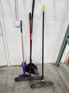 lot 265 image: Assorted Cleaning Tools - (2) Push Brooms, (1) Broom,  (1) Dust Pan, (1) Swiffer Spray Mop
