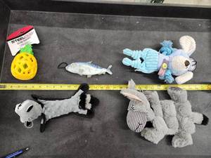 lot 121 image: Lot of (5) Steel Dog Assorted Dog Toys - Tuna, Puppy, Raccoon, Pineapple Slow Treater