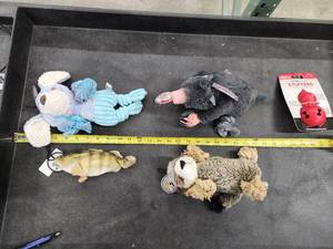 lot 124 image: Lot of (5) Steel Dog Assorted Dog Toys - Puppy, Sloth, Mole, Yellow Perch, Stuffers Spiked Bounce
