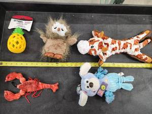 lot 129 image: Lot of (5) Steel Dog Assorted Dog Toys - Walleye, Bunny, Cow, Puppy, Eggplant Slow Treater