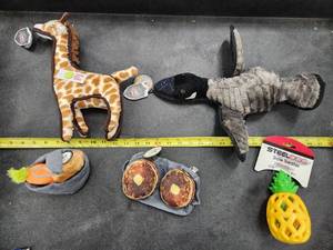 lot 138 image: Lot of (5) Steel Dog Assorted Dog Toys - Giraffe, Goose, Pancakes, Carrot and Potatoes, Pineapple Slow Treater