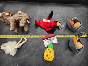 lot 139 image: Lot of (6) Steel Dog Assorted Dog Toys - Camel, Cardinal , Critter, Carrot and Potatoes, Pineapple Slow Treater