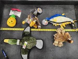 lot 144 image: Lot of (5) Steel Dog Assorted Dog Toys - Duck, Eagle, Tuna, Critter, Pineapple Slow Treater