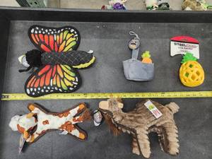 lot 110 image: Lot of (5) Steel Dog Assorted Dog Toys - Butterfly, Cow, Camel, Potato & Carrots, Pineapple Slow Treater