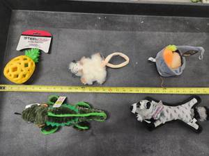 lot 112 image: Lot of (5) Steel Dog Assorted Dog Toys - Raccoon, Gator, Critter, Potato & Carrots, Pineapple Slow Treater