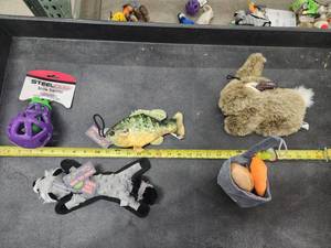 lot 114 image: Lot of (5) Steel Dog Assorted Dog Toys - Yellow Perch, Bunny, Raccoon, Potato & Carrots, Eggplant Slow Treater