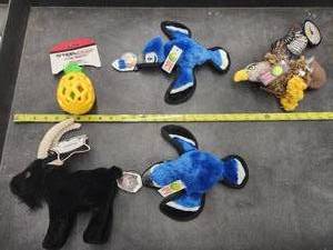 lot 49 image: Lot of (5) Steel Dog Assorted Dog Toys - Hawk, Goat, Blue Jays, Pineapple Slow-Treater
