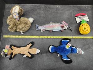 lot 57 image: Lot of (5) Steel Dog Assorted Dog Toys - Squirrel, Fish, Bunny, Blue Jay, Pineapple Slow-Treater
