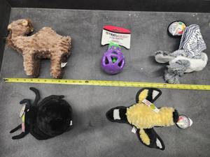 lot 60 image: Lot of (5) Steel Dog Assorted Dog Toys - Bunny, Squirrel, Fish, Blue Jay, Pineapple Slow-Treater