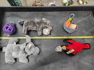 lot 84 image: Lot of (5) Steel Dog Assorted Dog Toys - Donkey, Cardinal, Eggplant Slow Treater, Carrots & Potatoes