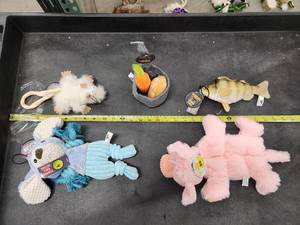 lot 85 image: Lot of (5) Steel Dog Assorted Dog Toys - Puppy, Carrots & Potatoes, Critter, Piggy, Yellow Perch