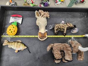 lot 91 image: Lot of (5) Steel Dog Assorted Dog Toys - Yellow Perch, Horse, Woolly Mammoth, Hyena, Pineapple Slow Treater