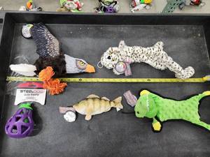 lot 92 image: Lot of (5) Steel Dog Assorted Dog Toys - Hawk, Cat, Yellow Perch, Gator, Eggplant Slow Treater