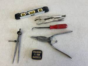lot 109 image: John Deere Belt Buckle & Hand Tools
