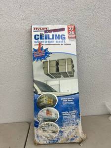 lot 208 image: NIB Ceiling Storage Unit
