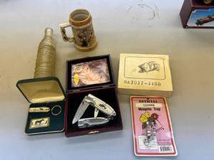 lot 306 image: Knives, Stein & Kist Bottle
