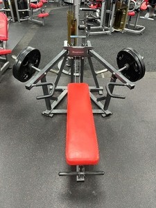 lot 14 image: Magnum  Flat Chest Press Measures 39 x 65 x 68 long. NOTE Weights not included