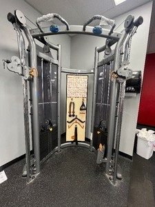 lot 2 image: Matrix all-in-one cable machine with attachments 42 x 67 x 91. Bring tools to disassemble.