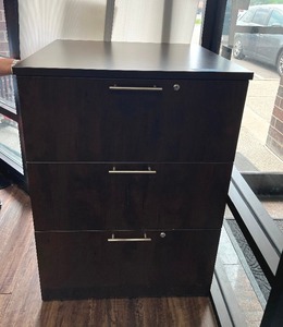 lot 109 image: 3-Drawer locking Cabinet with key. Measures 30 W X 30 D X 42 H. Bring help to move.
