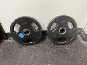 lot 108 image: (2) GP Weight Plates with 3 oval holes 25 LBS