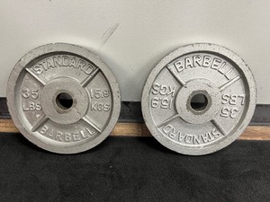 lot 85 image: (2) Barbell Standard Weight Plates 35 LBS