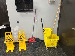 lot 123 image: Yellow Mop Bucket with side press and mop, Cedar Mop bucket and extendable telescope mop. 2 yellow Caution signs