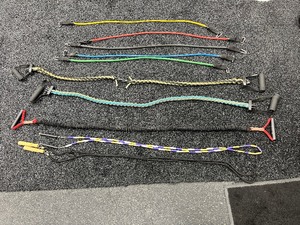 lot 135 image: Resistance bands and jump ropes.