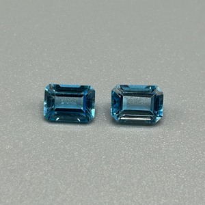 lot 9 image: 2.50 Carat Blue Topaz Faceted Rectangular Emerald Cut - Set of 2 Loose Stones
