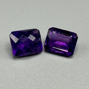 lot 24 image: 6.65 Carat Amethyst Faceted Checkerboard & Emerald Cut - Set of 2 Loose Stones (Rectangular)