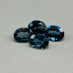 lot 28 image: 6.24 Carat London Blue Topaz Faceted Oval Cut - Set of 4 Loose Stones