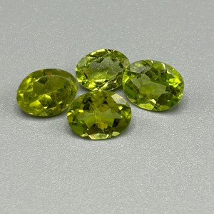 lot 38 image: 6.58 Carat Peridot Faceted Oval Cut - Set of 4 Loose Stones