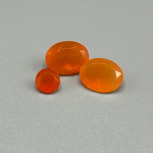 lot 46 image: 3.57 Carat Fire Opal Faceted Round & Oval Cut - Various Size & Shape Set of 3 Loose Stones