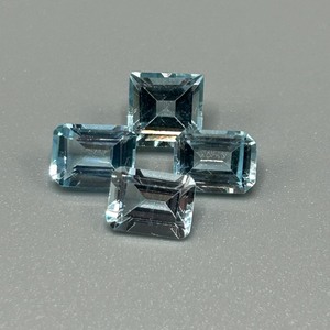 lot 65 image: 8.86 Carat Blue Topaz Rectangular Emerald Cut - Set of 4 Loose Stones
