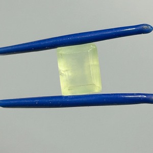 lot 67 image: 6 Carat Prehnite Faceted Rectangular Emerald Cut