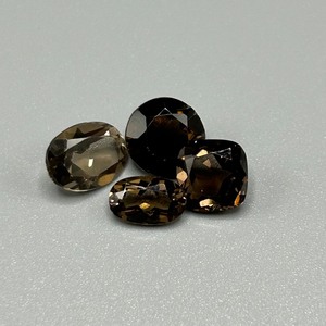 lot 70 image: 6.87 Carat Smoky Quartz Faceted Mix Cut - Various Size & Shape Set of 4 Loose Stones