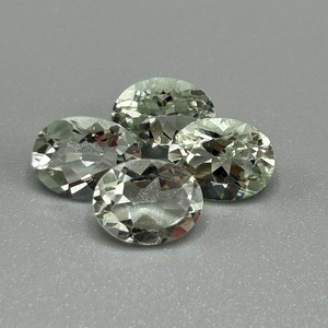 lot 113 image: 7.10 Carat Prasiolite Quartz Faceted Oval Cut - Set of 4 Loose Stones