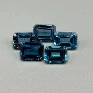 lot 120 image: 9.55 Carat London Blue Topaz Rectangular Emerald Cut - Set of 4 Loose Stones