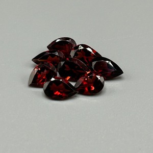 lot 123 image: 8.02 Carat Garnet Faceted Pear Cut - Lot of 8 Loose Stones