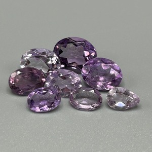 lot 124 image: 10.41 Carat Amethyst Faceted Mixed Cut - Various Size, Color & Shape Set of 8 Loose Stones