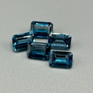 lot 128 image: 6.23 Carat London Blue Topaz Faceted Rectangular Emerald Cut - Set of 5 Loose Stones